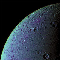 <p>
	This view highlights tectonic faults and craters on Dione, an icy world that has undoubtedly experienced geologic activity since its formation.</p>
<p>
	To create the enhanced-color view, ultraviolet, green and infrared images were combined into a single black and white picture that isolates and maps regional color differences. This 'color map' was then superposed over a clear-filter image. The origin of the color differences is not yet understood, but may be caused by subtle differences in the surface composition or the sizes of grains making up the icy soil.</p>
<p>
	This view looks toward the leading hemisphere on Dione (1,126 kilometers, or 700 miles across). North is up and rotated 20 degrees to the right.</p>
<p>
	See PIA07690 for a similar monochrome view.</p>
<p>
	All images were acquired with the Cassini spacecraft narrow-angle camera on Dec. 24, 2005 at a distance of approximately 151,000 kilometers (94,000 miles) from Dione and at a Sun-Dione-spacecraft, or phase, angle of 99 degrees. Image scale is 896 meters (2,940 feet) per pixel.</p>
