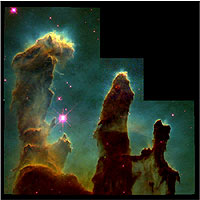 The Eagle Nebula, as photographed by the Hubble Space Telescope. This famous photo, often known as 'The Pillars of Creation,' shows giant nebular clouds being evaporated by the ferocious energy of massive stars, exposing emerging solar systems, much like our own.
<P>
Credit: NASA/HST/Jeff Hester and Paul Scowen

