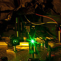 <p>
	The optical table in Marko Loncar's laboratory at Harvard University.</p>
<p>
	Credit: Photo by Eliza Grinnell / Harvard SEAS</p>
