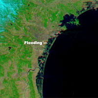 <p>
	Coastal flooding from the March 11, 2011 tsunami triggered by a magnitude 8.9 earthquake off Japan's northeast coast can be seen in this image from the NASA's Terra spacecraft.</p>
<p>
	Image credit: NASA/GSFC/LaRC/JPL</p>
