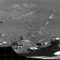 <p>
	This 360-degree panorama shows evidence of a successful first test drive for NASA's Curiosity rover. On Aug. 22, 2012, the rover made its first move, going forward about 15 feet (4.5 meters), rotating 120 degrees and then reversing about 8 feet (2.5 meters). Curiosity is about 20 feet (6 meters) from its landing site, now named Bradbury Landing.</p>
<p>
	Image credit: NASA/JPL-Caltech</p>
