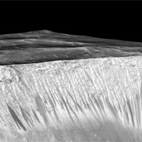 <p>Mars’ Valles Marineris canyon, pictured, spans as much as 600 kilometers across and delves as much as 8 kilometers deep. The image was created from over 100 images of Mars taken by Viking Orbiters in the 1970s.</p>

<p>Image: NASA</p>
