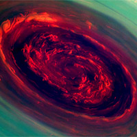 <p>
	The spinning vortex of Saturn's north polar storm resembles a deep red rose of giant proportions surrounded by green foliage in this false-color image from NASA's Cassini spacecraft. Measurements have sized the eye at a staggering 1,250 miles (2,000 kilometers) across with cloud speeds as fast as 330 miles per hour (150 meters per second).</p>
<p>
	This image is among the first sunlit views of Saturn's north pole captured by Cassini's imaging cameras. When the spacecraft arrived in the Saturnian system in 2004, it was northern winter and the north pole was in darkness. Saturn's north pole was last imaged under sunlight by NASA's Voyager 2 in 1981; however, the observation geometry did not allow for detailed views of the poles. Consequently, it is not known how long this newly discovered north-polar hurricane has been active.</p>
<p>
	The images were taken with the Cassini spacecraft narrow-angle camera on Nov. 27, 2012, using a combination of spectral filters sensitive to wavelengths of near-infrared light. The images filtered at 890 nanometers are projected as blue. The images filtered at 728 nanometers are projected as green, and images filtered at 752 nanometers are projected as red. In this scheme, red indicates low clouds and green indicates high ones.</p>
<p>
	The view was acquired at a distance of approximately 261,000 miles (419,000 kilometers) from Saturn and at a sun-Saturn-spacecraft, or phase, angle of 94 degrees. Image scale is 1 mile (2 kilometers) per pixel.</p>
