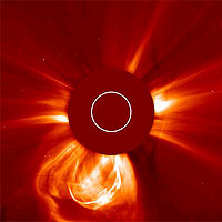 Outburst of gas from near the Sun’s south pole. The bright loop is cool, strongly magnetized material being swept away from the Sun. The white ring inside the central mask shows the size of the visible Sun. 
<P>
Credits: SOHO/LASCO