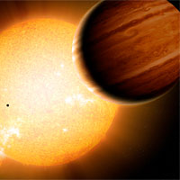 <p>An artist’s portrayal of a Warm Jupiter gas-giant planet (r.) in orbit around its parent star, along with smaller companion planets. Image credit: Detlev Van Ravenswaay/Science Photo Library</p>
